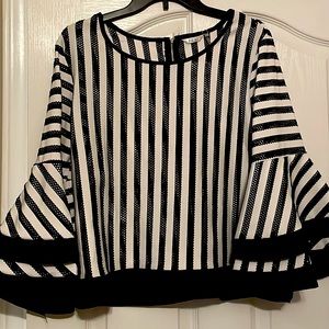 Black and white striped KAKTUS blouse. It is a size US Large. Never worn (tags).